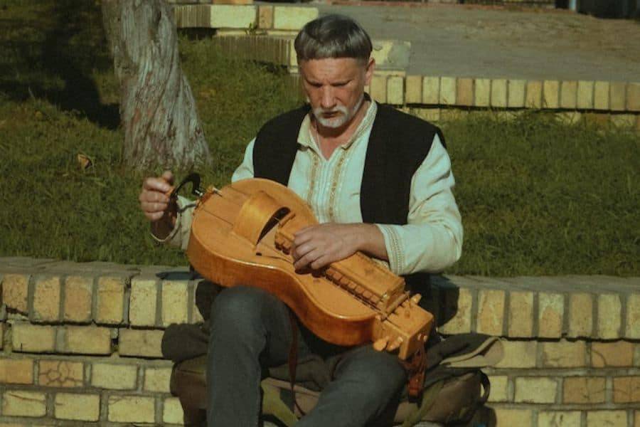 String Instruments Held between Knees Full List Musiicz