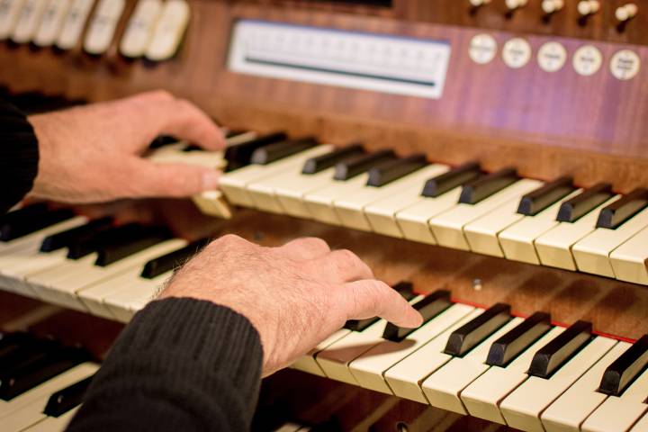 musician playing organ